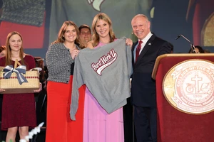 Three People holding Hard Work U Sweatshirt